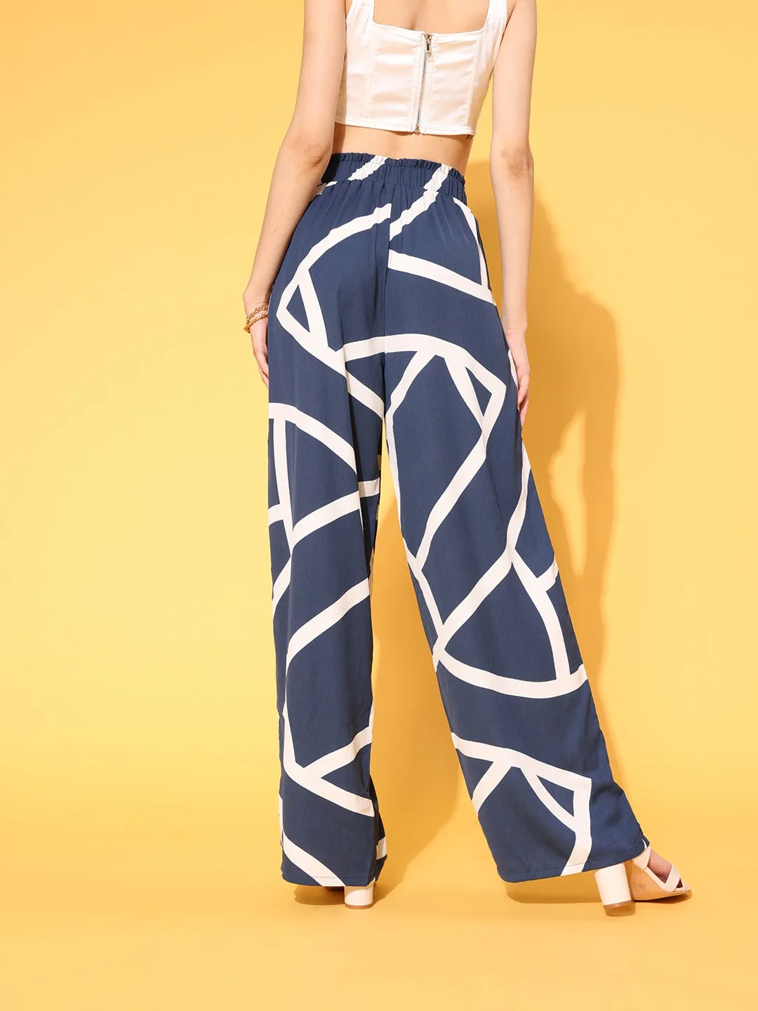 Berrylush Women Navy Blue & White Geometric Printed High-Rise Elastic Waist Pleated Trousers