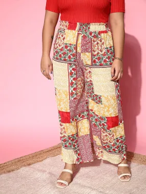 Berrylush Women Plus Size Red Ethnic Motifs Printed High-Rise Waist Pleated Roman Column Trousers