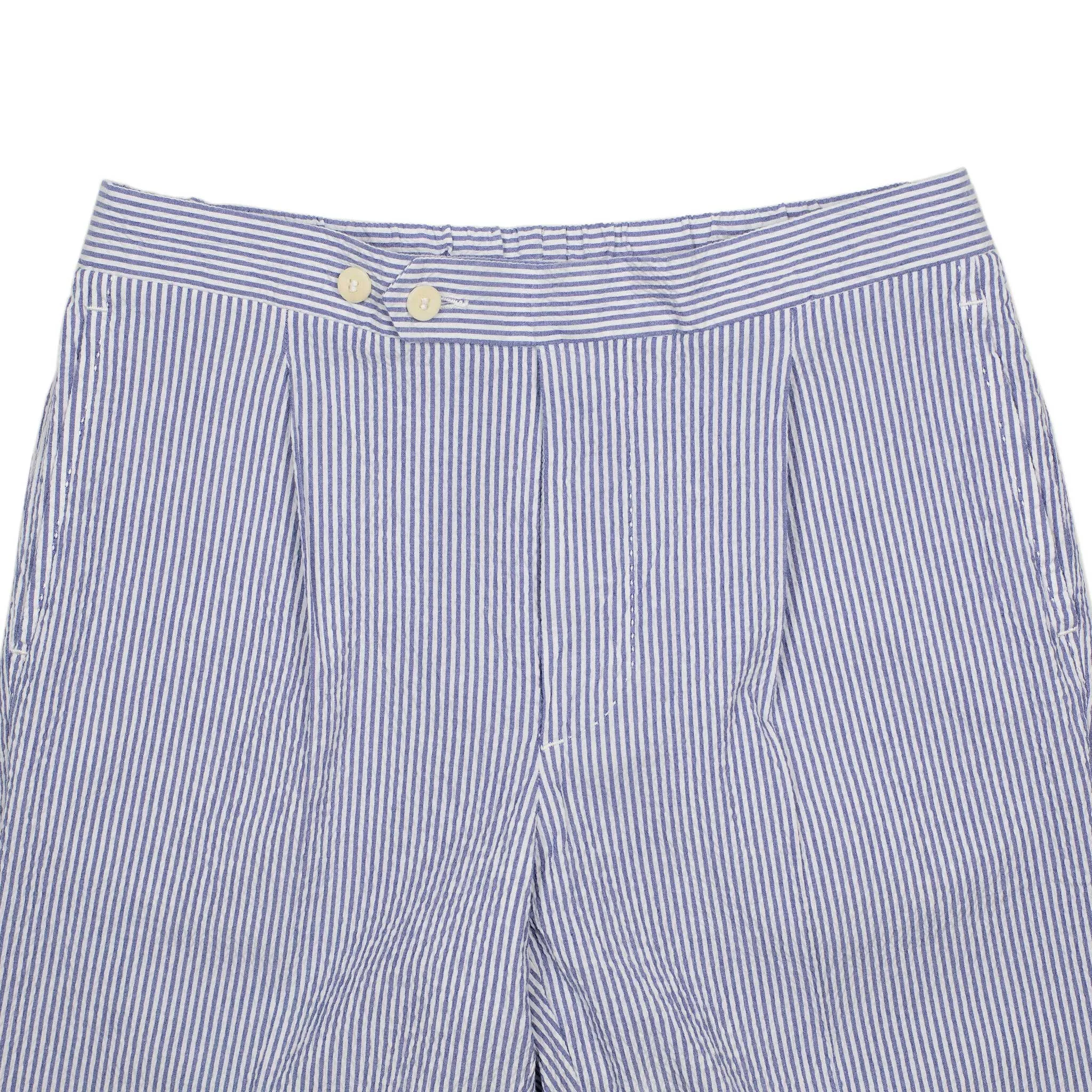 Exclusive single-pleated easy pants in blue cotton seersucker