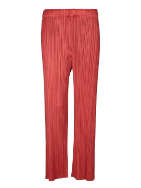 Pleats Please red trousers